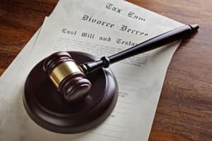 A judge's gavel rests on top of legal documents, including a divorce decree and a last will and testament—key paperwork when contesting a will—on a wooden desk.