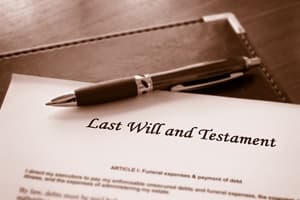 A pen rests on top of a document titled "Last Will and Testament," possibly outlining an Informal Will, with a leather folder partially visible underneath. The image is in sepia tones.